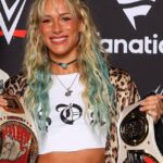 Promotional graphic of WWE NXT star Sol Ruca holding the North American and Speed Championship titles in 2025